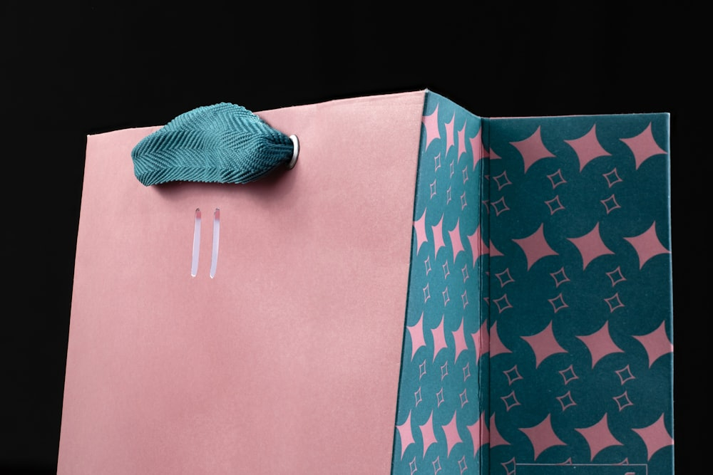 pink and blue paper bag