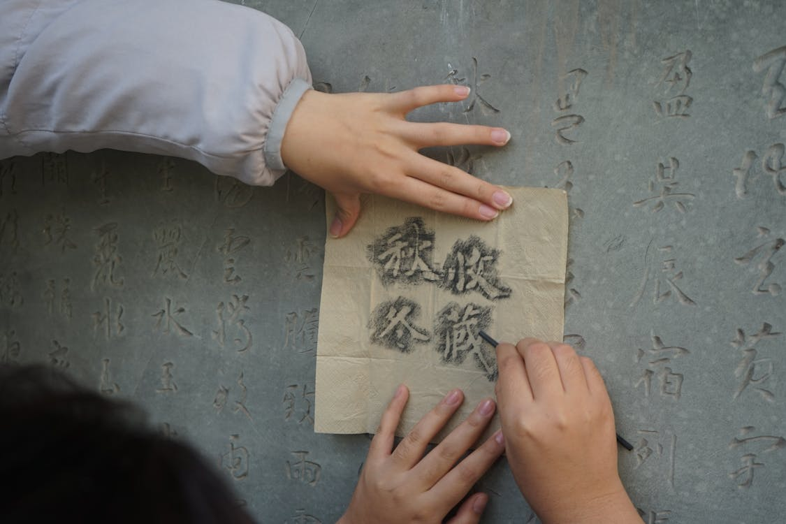 tracing paper used for copying symbols from a wall 