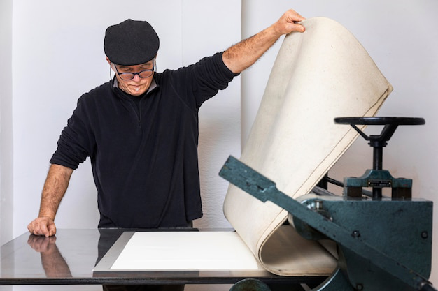 a person working with custom paper 