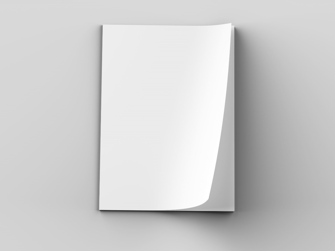 A flat lay image of a glossy stack of paper.